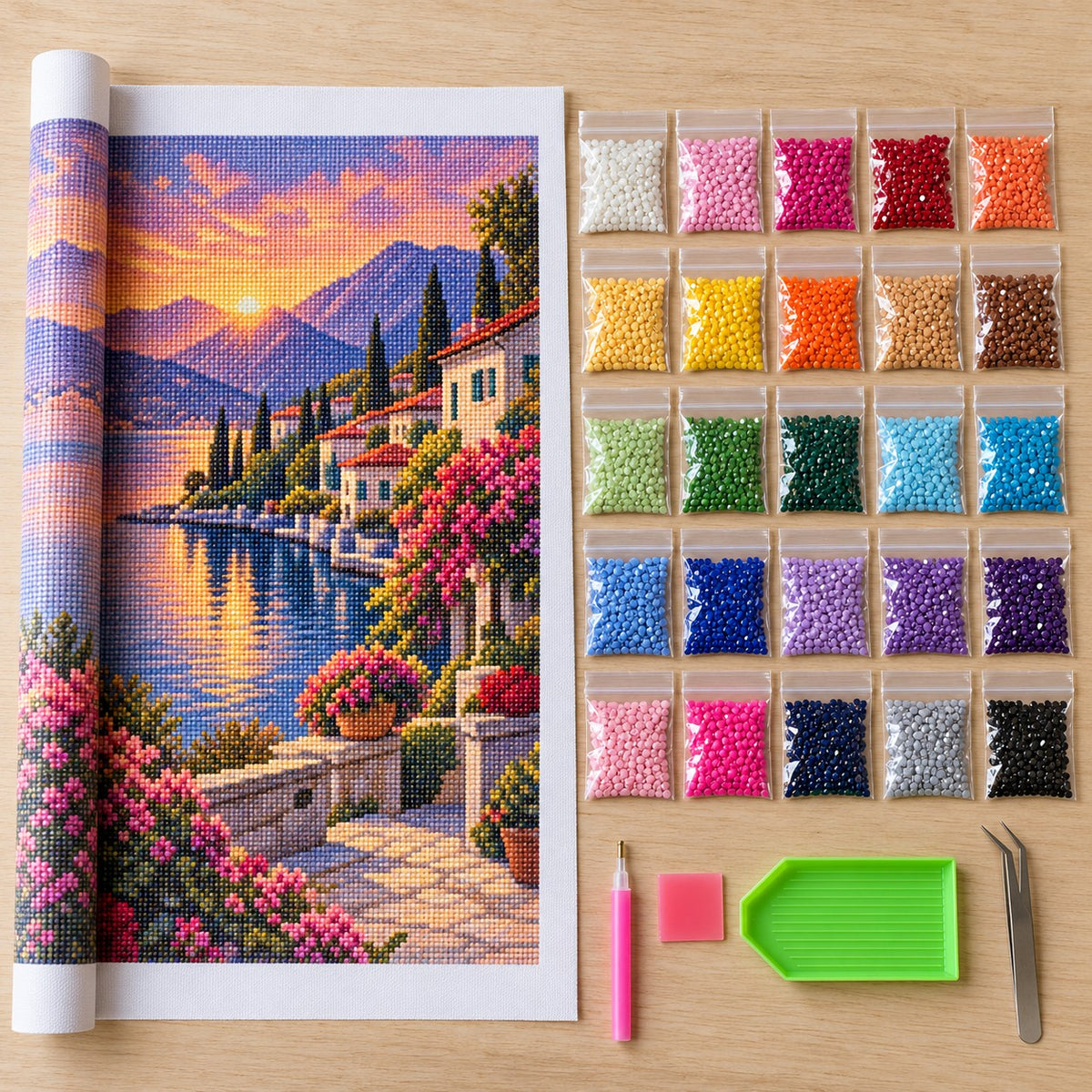 Inhoud van de diamond painting kit met canvas, steentjes, pen en wax